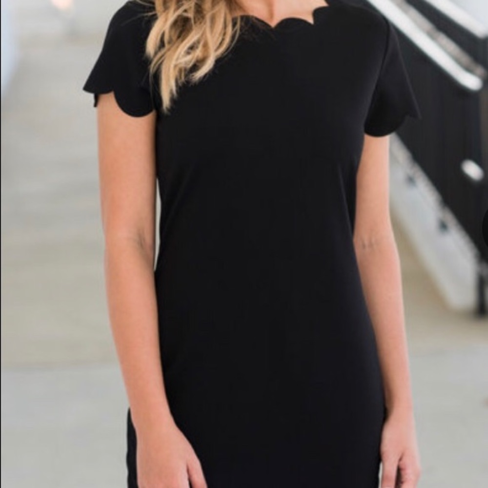 Short scalloped black dress